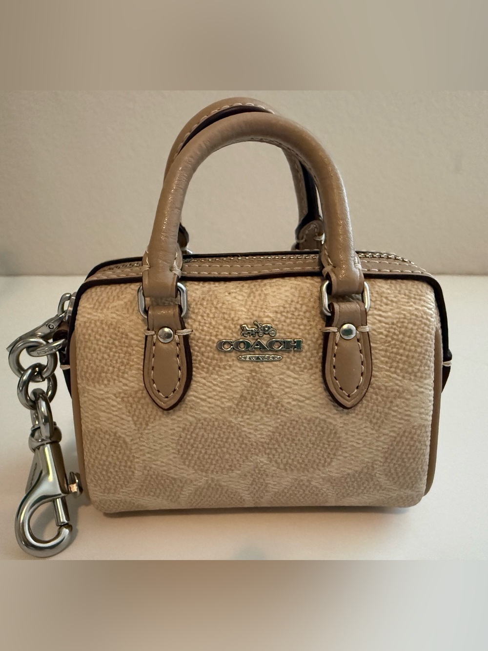 COACH Mini Rowan
Satchel Bag Charm In Signature
Canvas Sand/Taupe